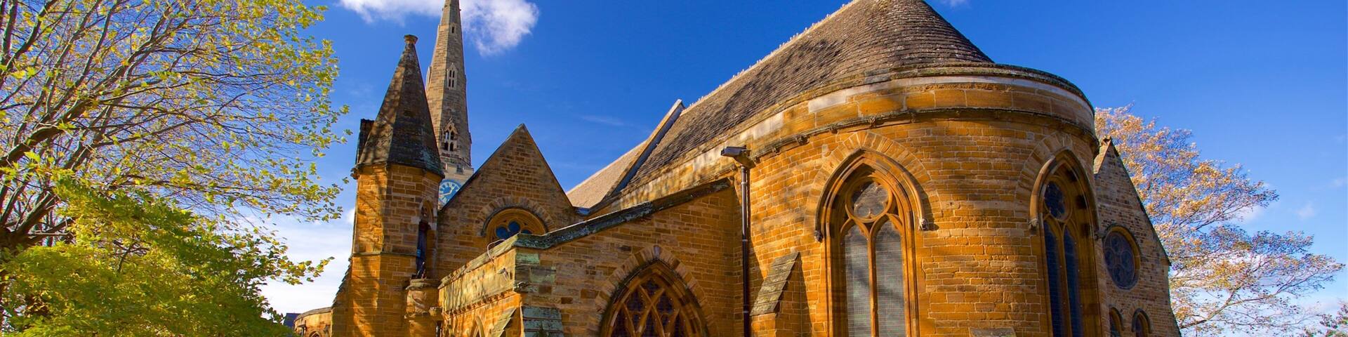 Church of the Holy Sepulchre featuring a church or cathedral, a cemetery and heritage elements
