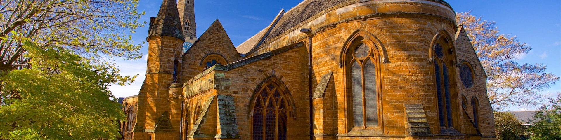 Church of the Holy Sepulchre featuring a church or cathedral, a cemetery and heritage elements