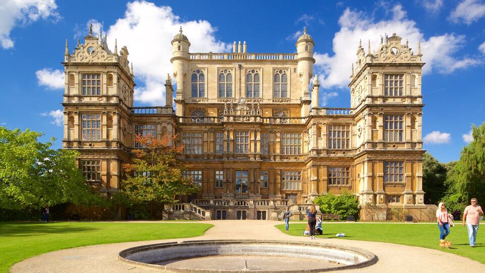 A large, ornate building with multiple towers and a central courtyard.