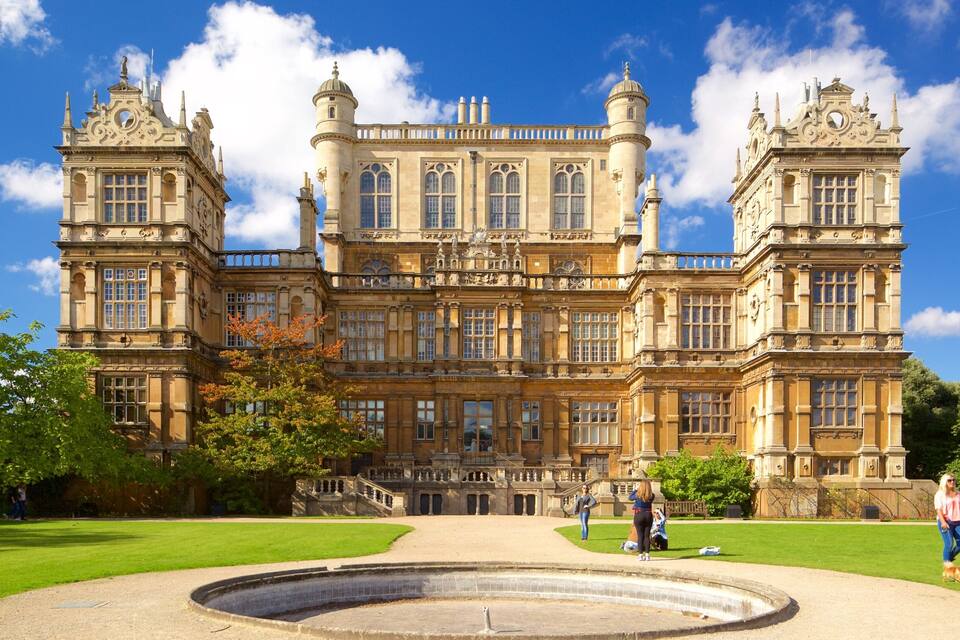 A large, ornate building with multiple towers and a central courtyard.