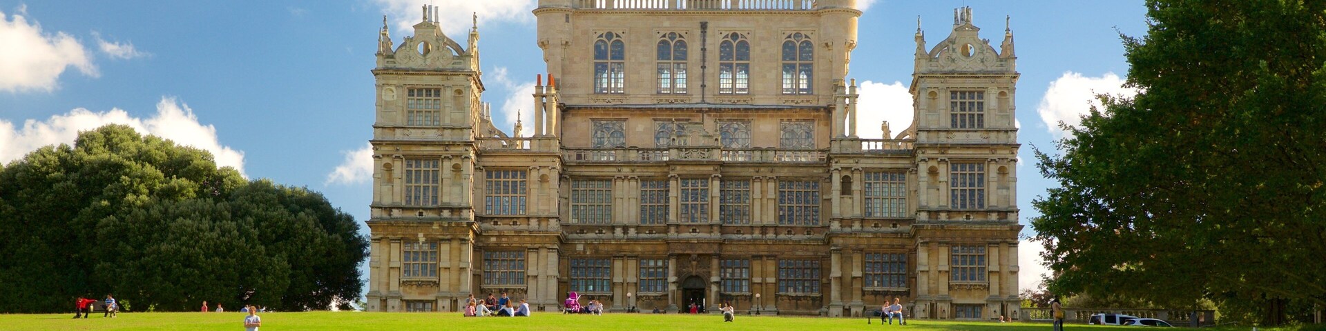 Wollaton Hall which includes heritage architecture and a garden