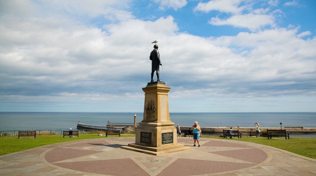 Captain Cook Monument showing a statue or sculpture, a square or plaza and general coastal views