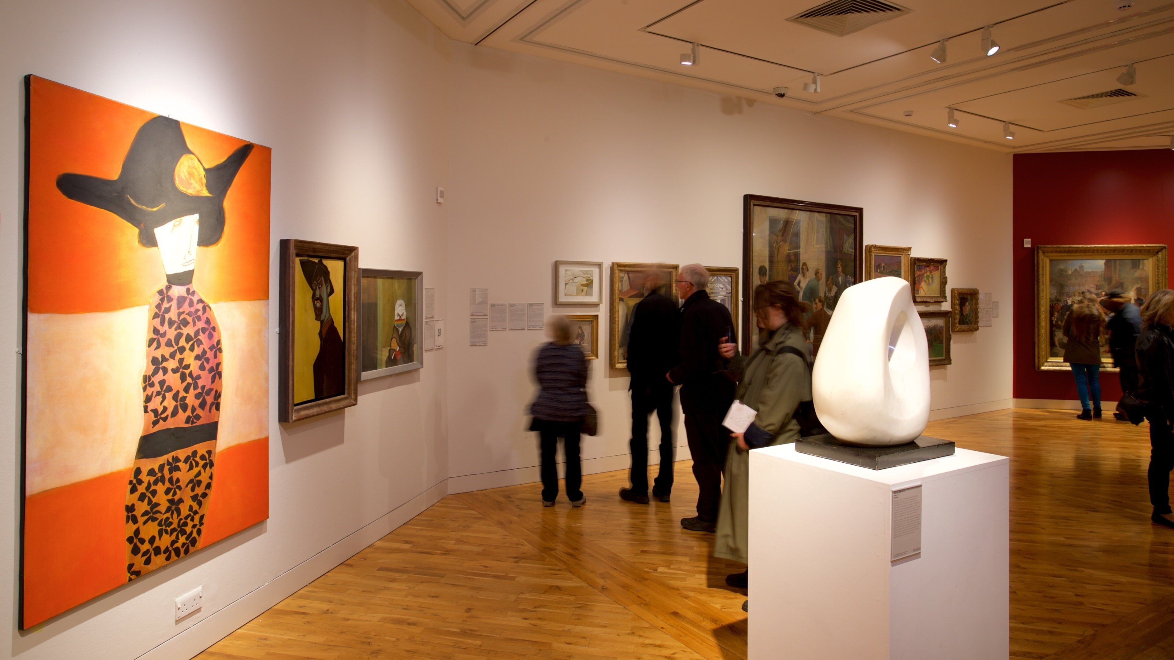 Ferens Art Gallery showing interior views and art as well as a small group of people