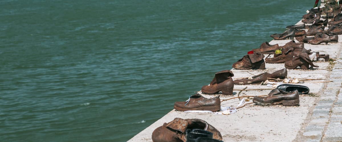 Shoes on the Danube showing a river or creek