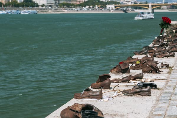 Shoes on the Danube showing a river or creek