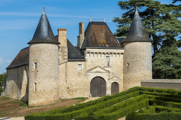 Chateau Vayres in Chasseneuil du Poitou with two towers and boxwood.; Shutterstock ID 398436373