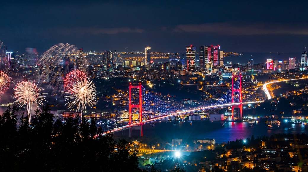 Fireworks over Istanbul Bosphorus during Turkish Republic Day celebrations. Fireworks with 15th July Martyrs Bridge (Bosphorus Bridge). Istanbul, Turkey.