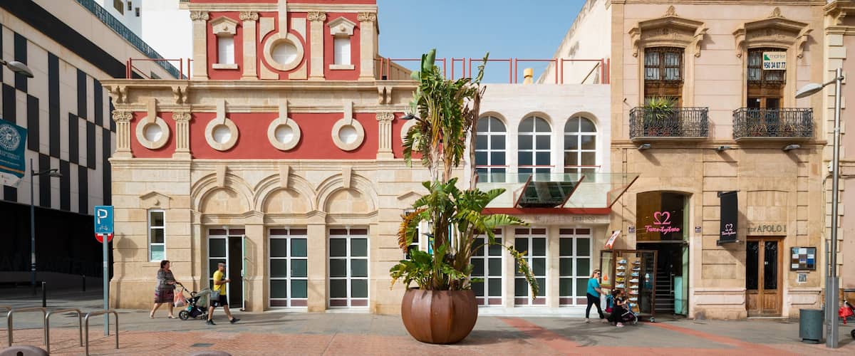 Teatro Apolo with a large planter in front.