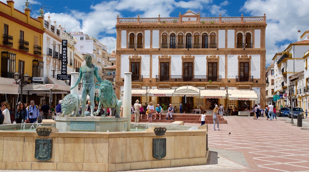 Ronda mostrando una estatua o escultura, un parque o plaza y una fuente