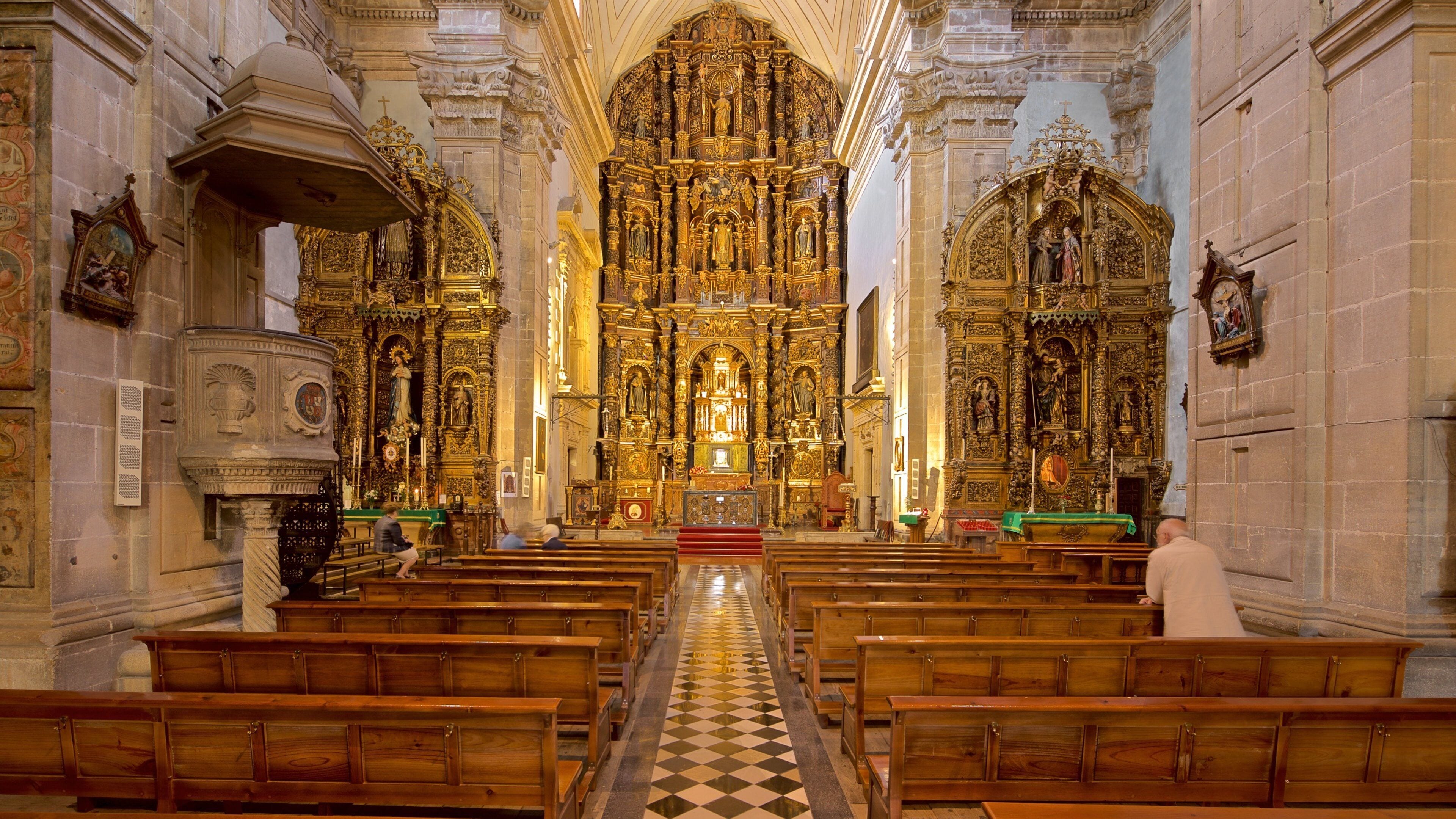 Church of San Isidoro which includes heritage elements, interior views and a church or cathedral