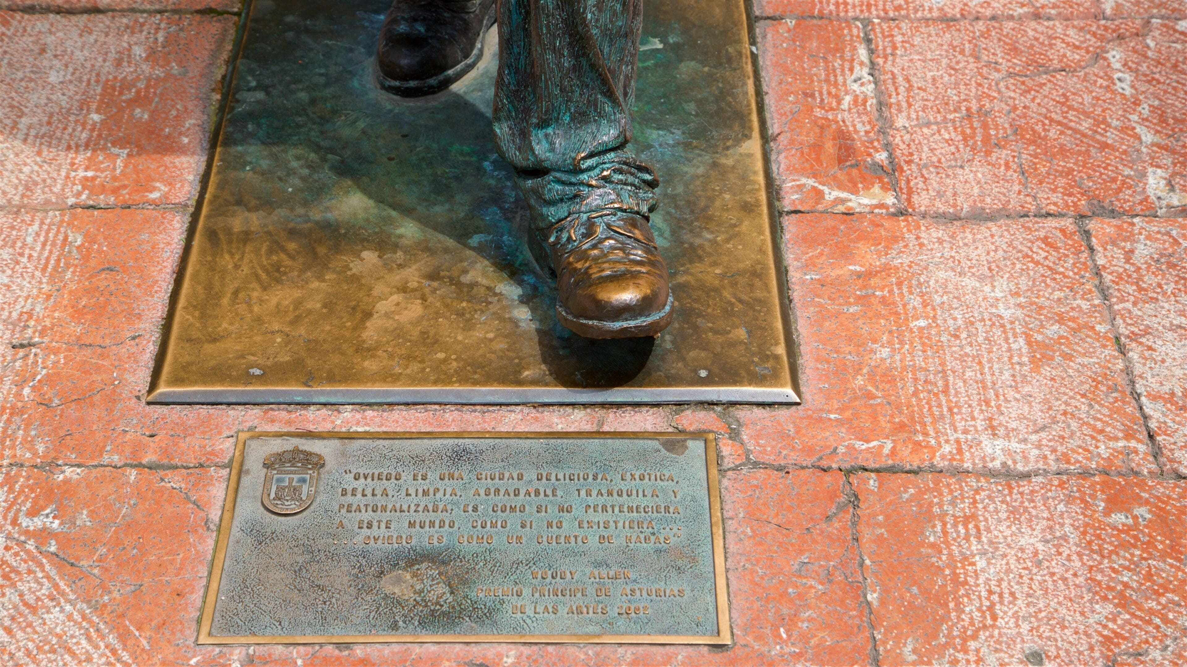 Woody Allen Statue which includes a statue or sculpture
