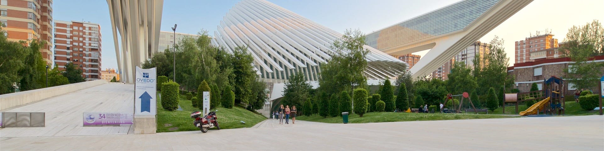 A modern architectural structure with unique, curved design elements.