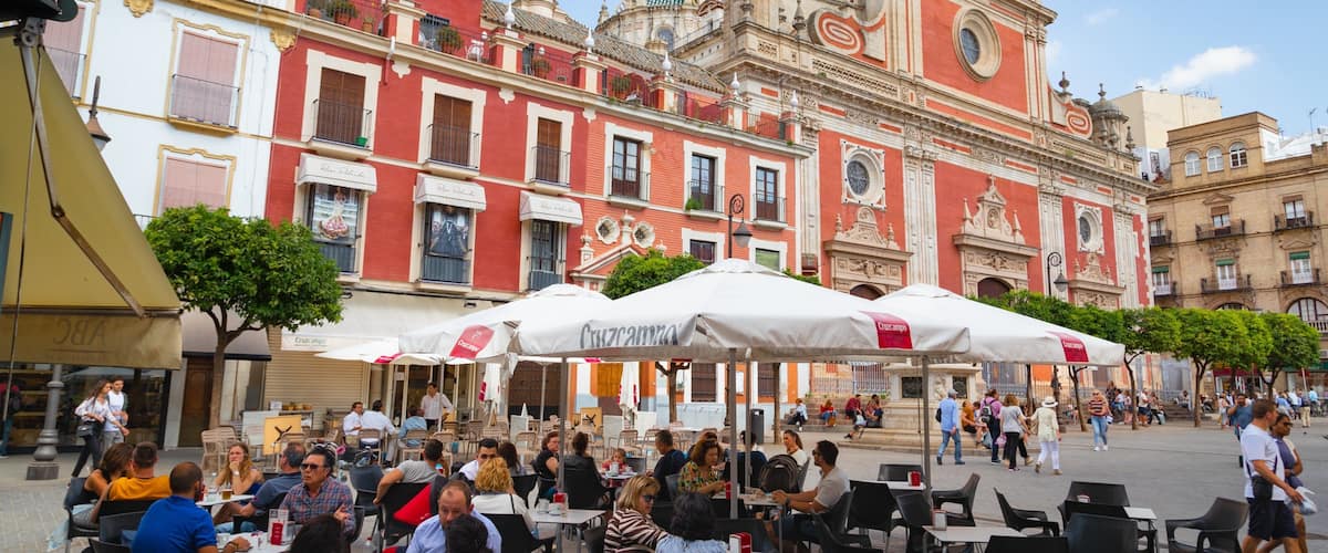 Salvador Plaza which includes heritage architecture and outdoor eating as well as a small group of people