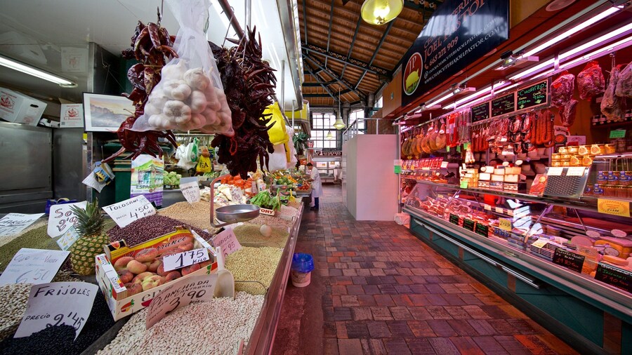 Mercado La Esperanza featuring food, markets and interior views