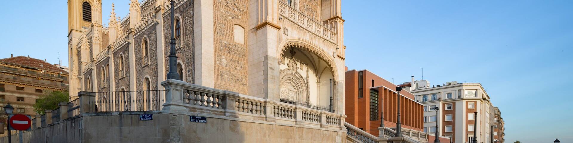 A historic cathedral with intricate Gothic architecture, including pointed arches and detailed stone carvings.