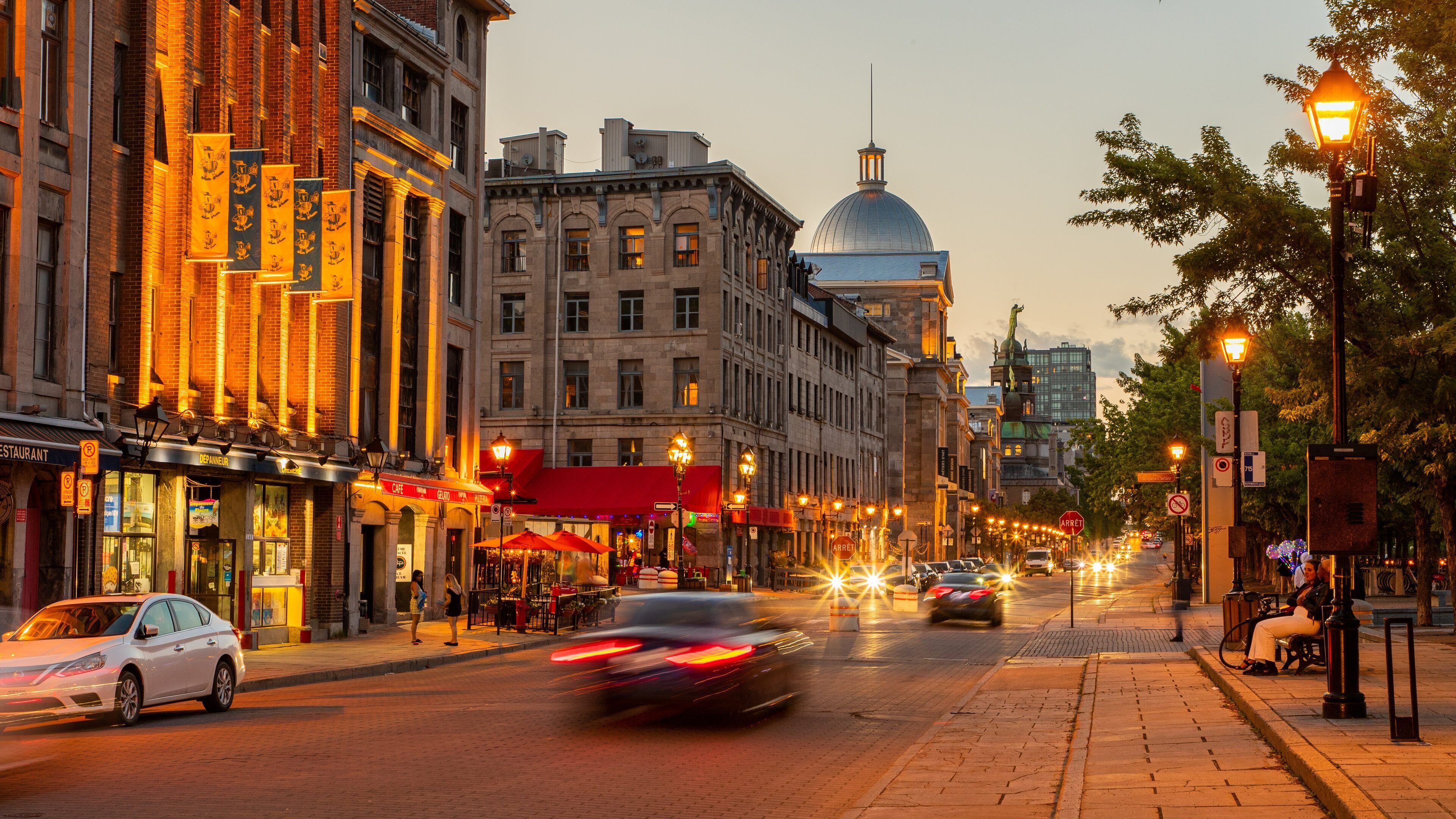Old Port of Montreal showing a sunset and a city