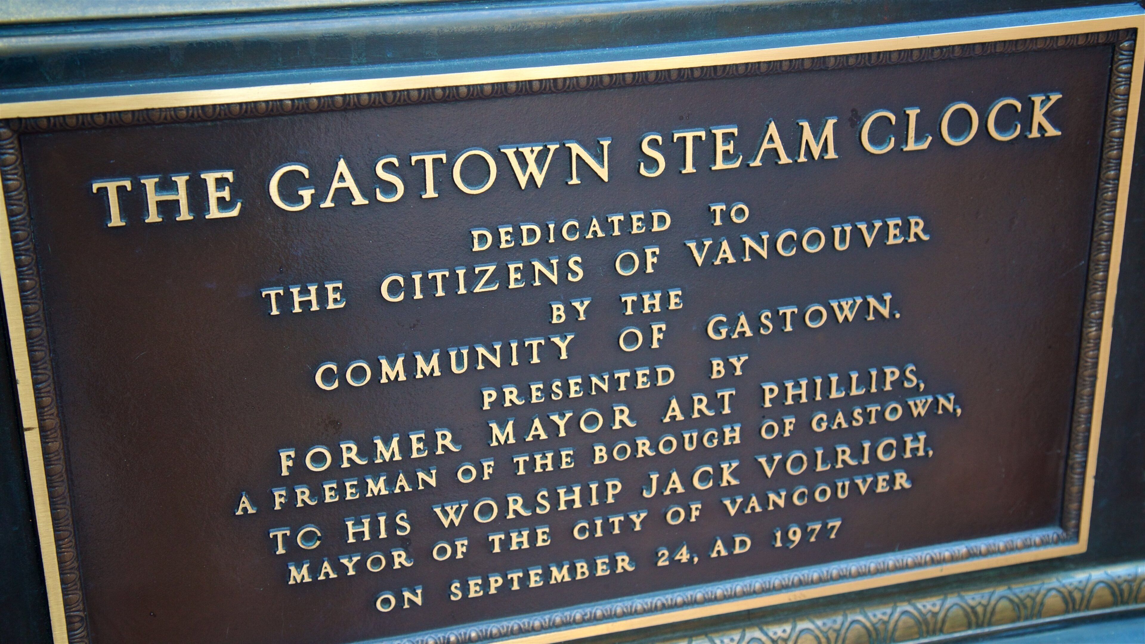 Gastown Steam Clock showing signage