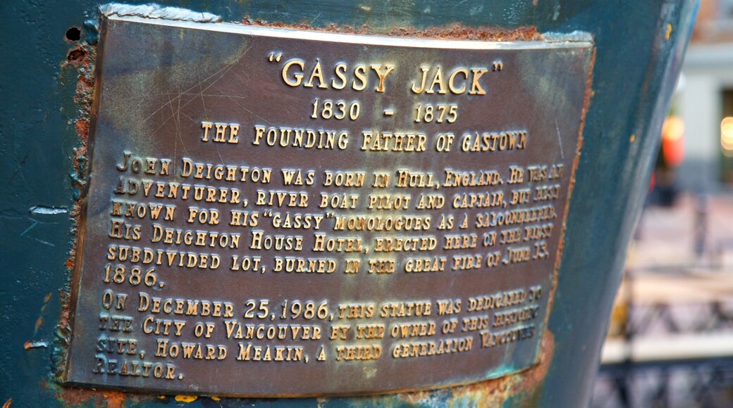 Gassy Jack Statue showing signage and a statue or sculpture