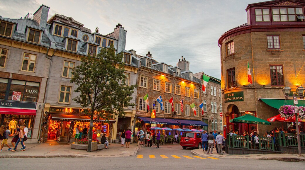 Rue St-Paul featuring a city, a sunset and street scenes