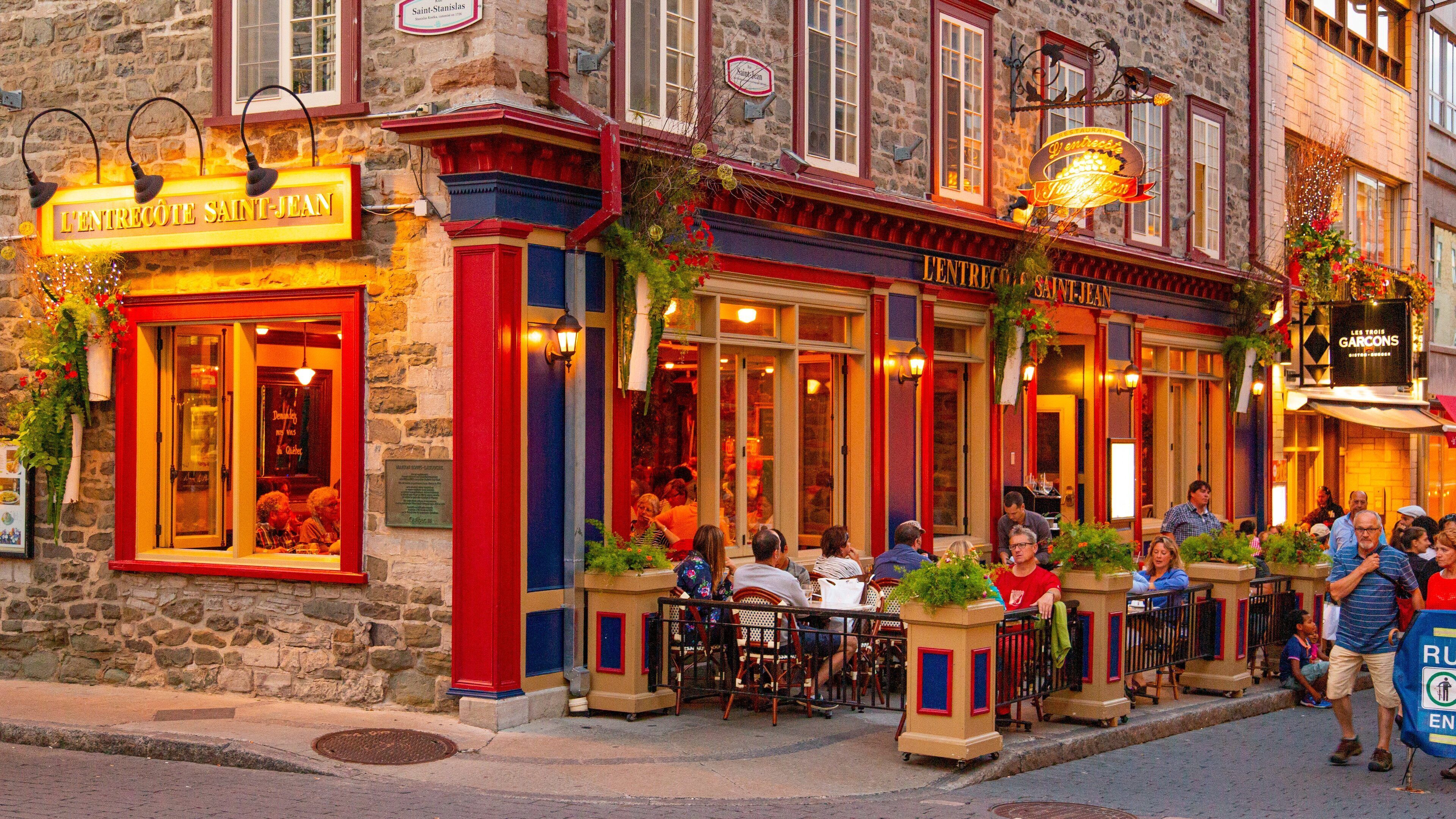 Rue St-Paul showing street scenes as well as a small group of people