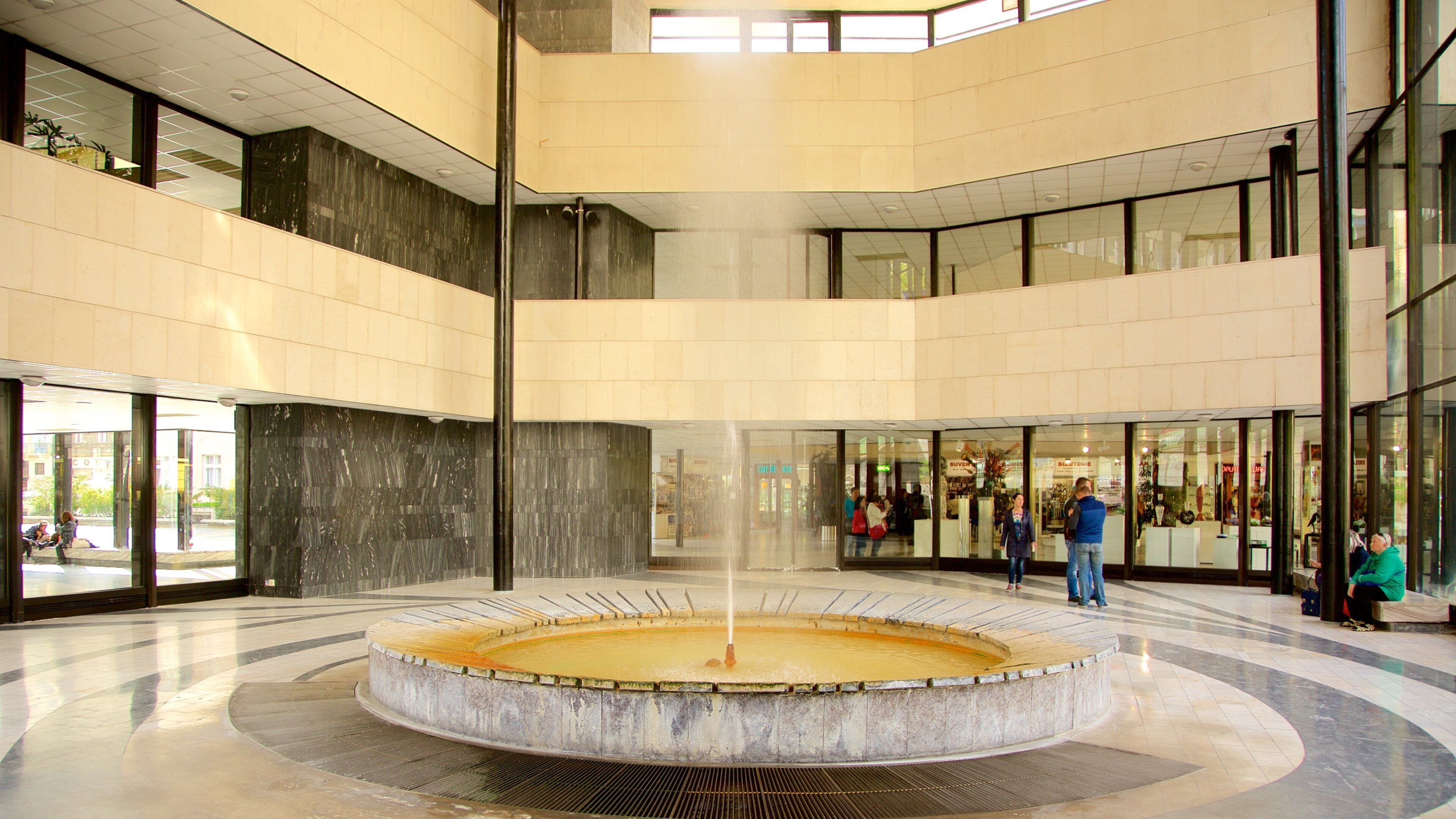 Hot Spring Colonnade showing interior views and a fountain