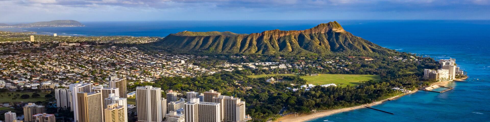 Waikiki skyline with Queen Kapiolani Regional Park, Kuhio Beach, and Diamond Head in the background
