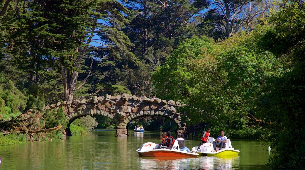 Stow Lake showing boating, a bridge and a river or creek