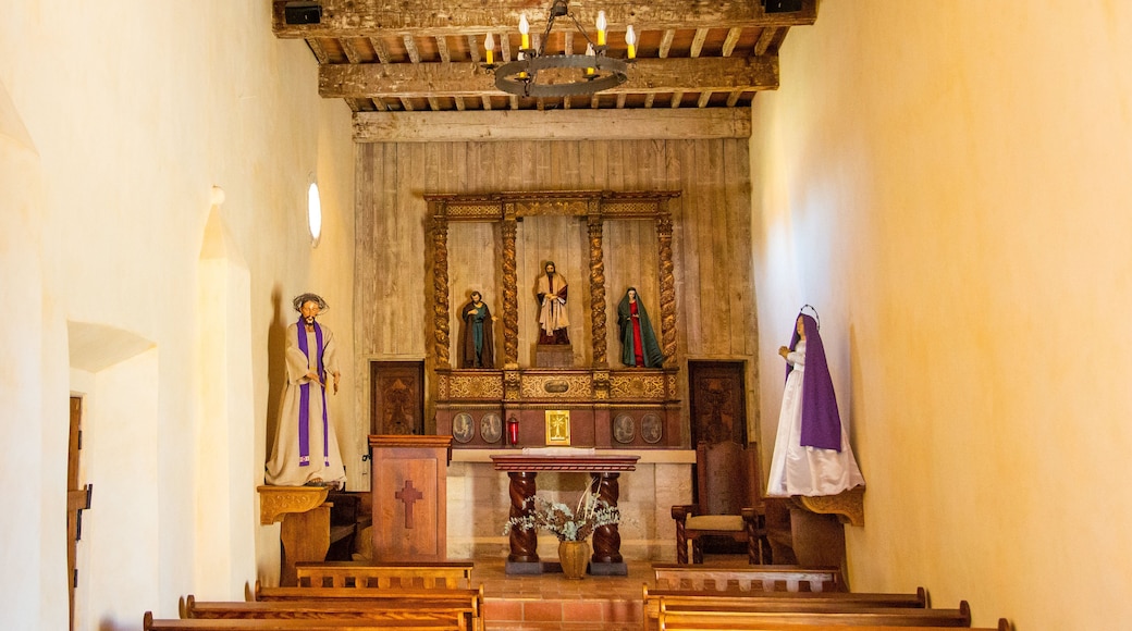 Mission San Juan featuring interior views and a church or cathedral
