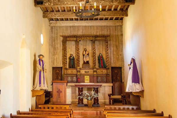 Mission San Juan featuring interior views and a church or cathedral