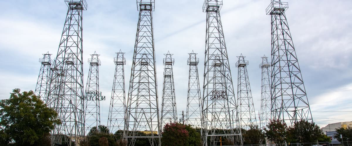 Iron oil derricks in the World's Richest Acre Park in downtown Kilgore, where the greatest concentration of oil wells in the world once stood, in Gregg and Rusk counties, Texas, USA