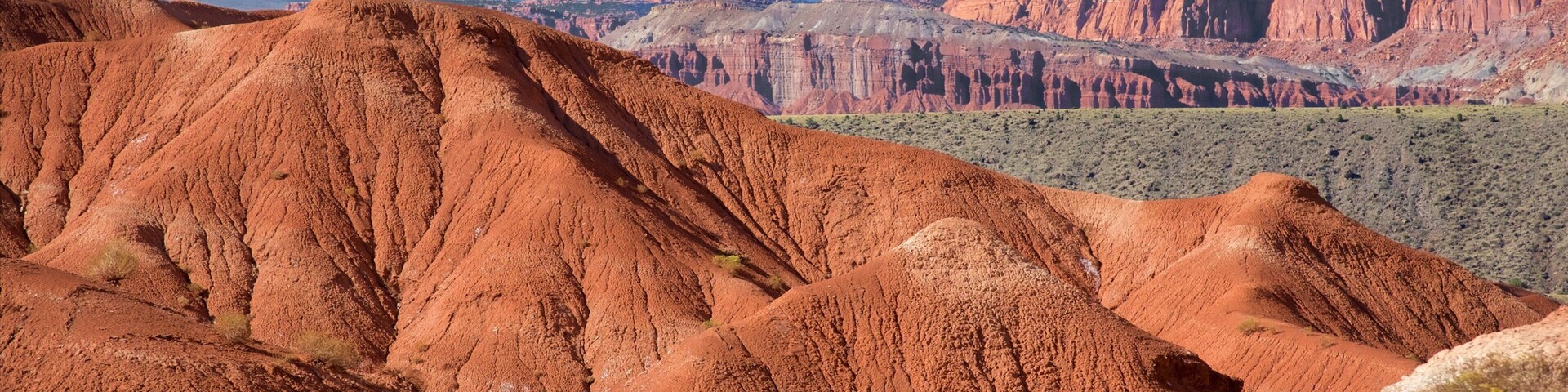 Rim Road Scenic Drive which includes a gorge or canyon, tranquil scenes and desert views