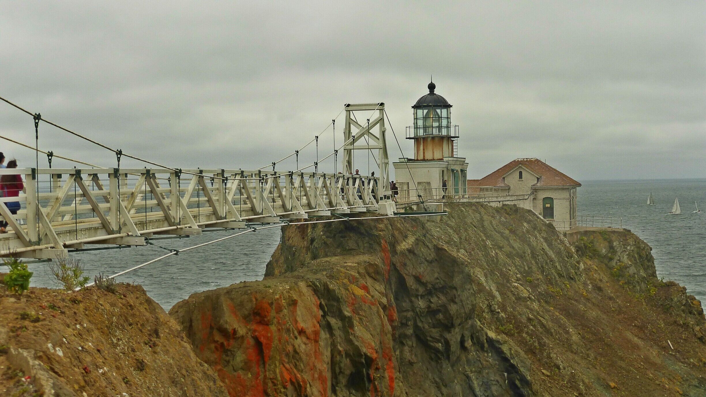 At the end of a 0.5mile hike after passing through a tunnel lies the gorgeous Point Bonita lighthouse. Marin Headlands had rugged, rocky landscapes dotted with wildflowers along the way. The strong wind blowing and the grey hued skies and seas was perfect for visiting a lighthouse. We decided to head to San Francisco using the Golden Gate Bridge initially, but had to take a huge detour to use the Bay Bridge as we didn't have FasTrak and the offices were already closed by then.  The silver lining(haha, how apt) was that we managed to see Sausalito.. but it made us really late, and Fort Point was already closed.. and we had to settle for Boudin for dinner =P

[August '14]
