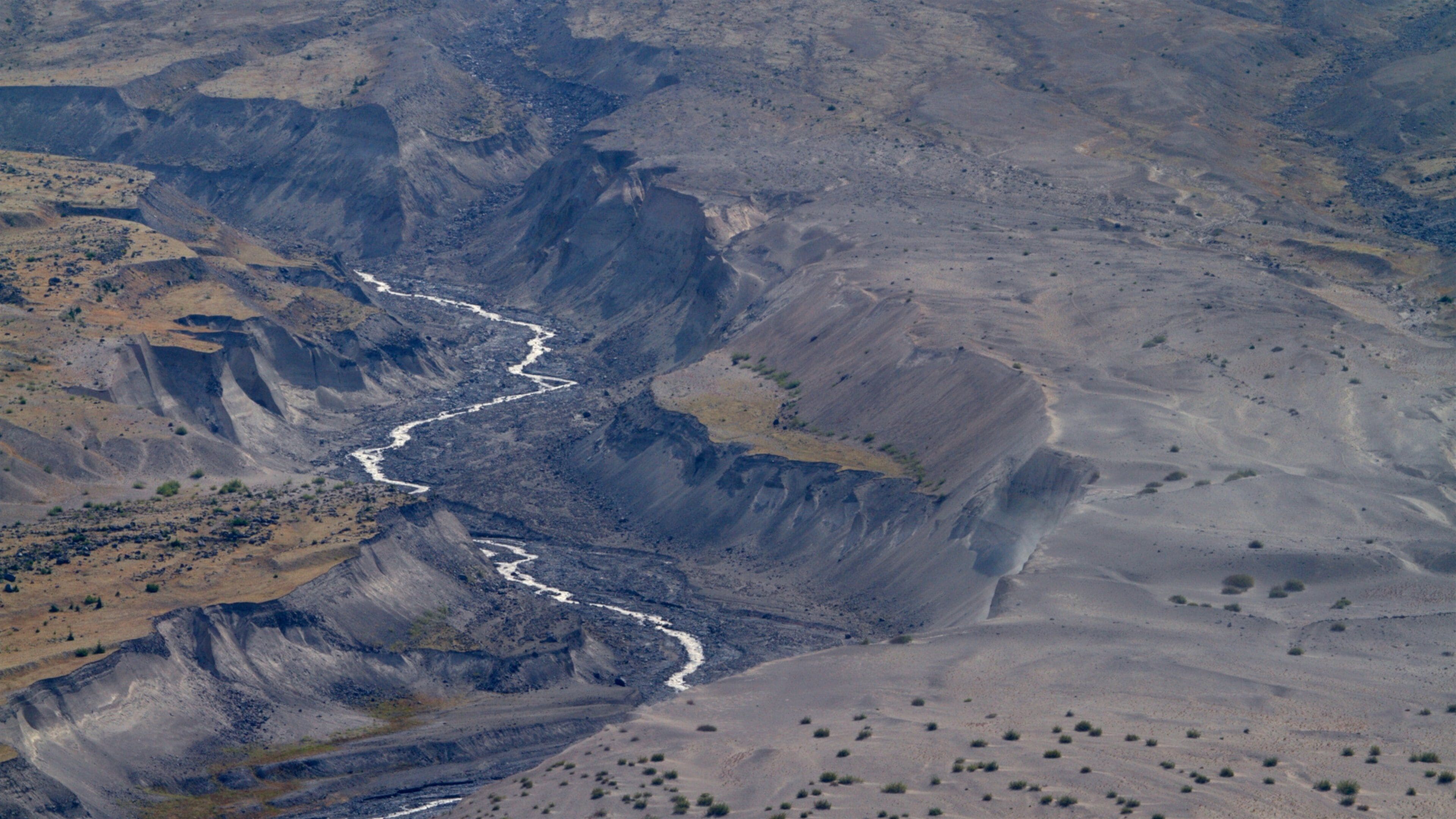 Portland som viser ørkenutsikt, rolig landskap og elv eller bekk