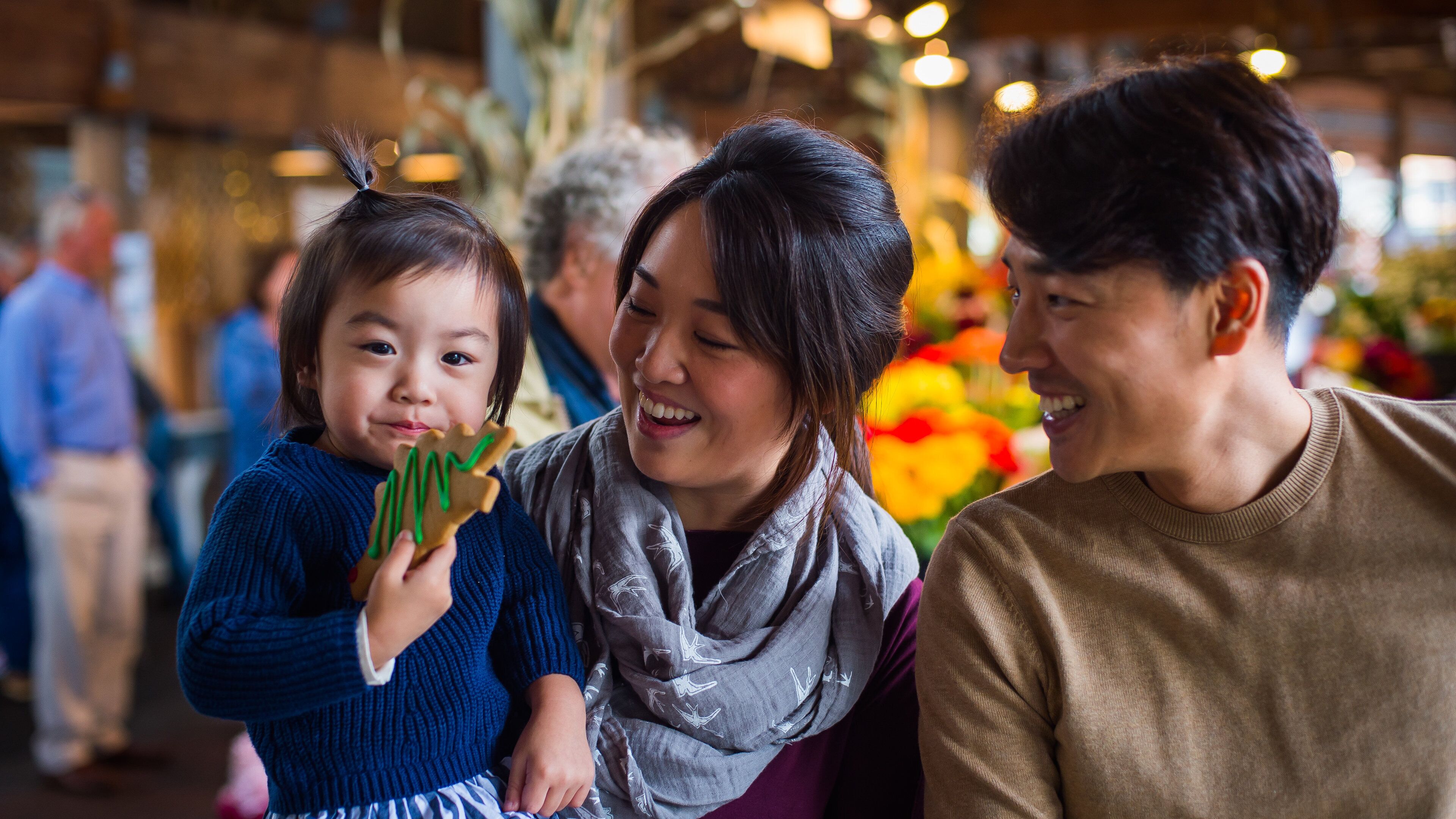 Olympia Farmers Market as well as a family