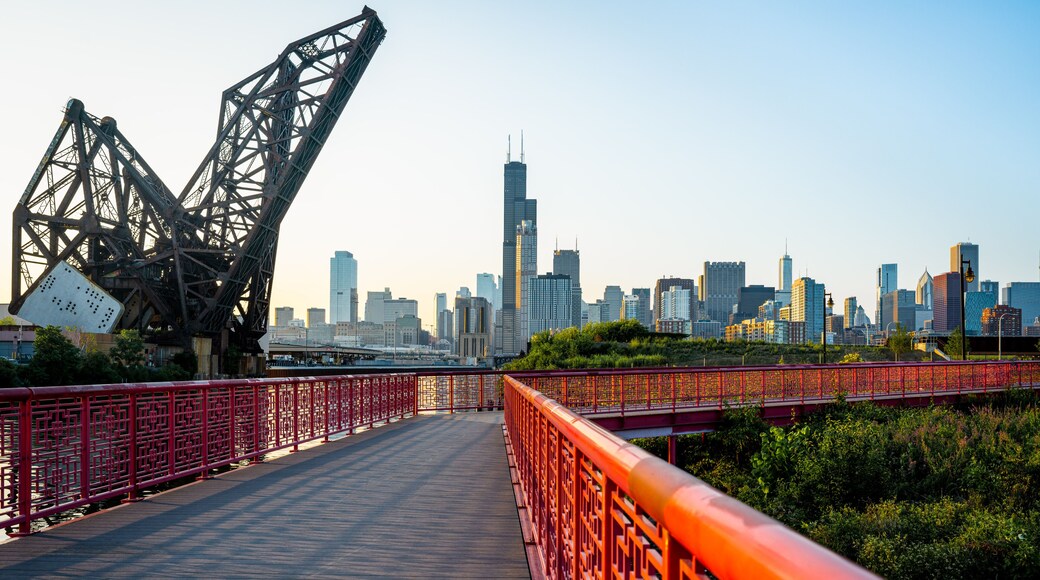 Chicago, Illinois skyline seen from Ping Tom Memorial Park with footbridge at dusk