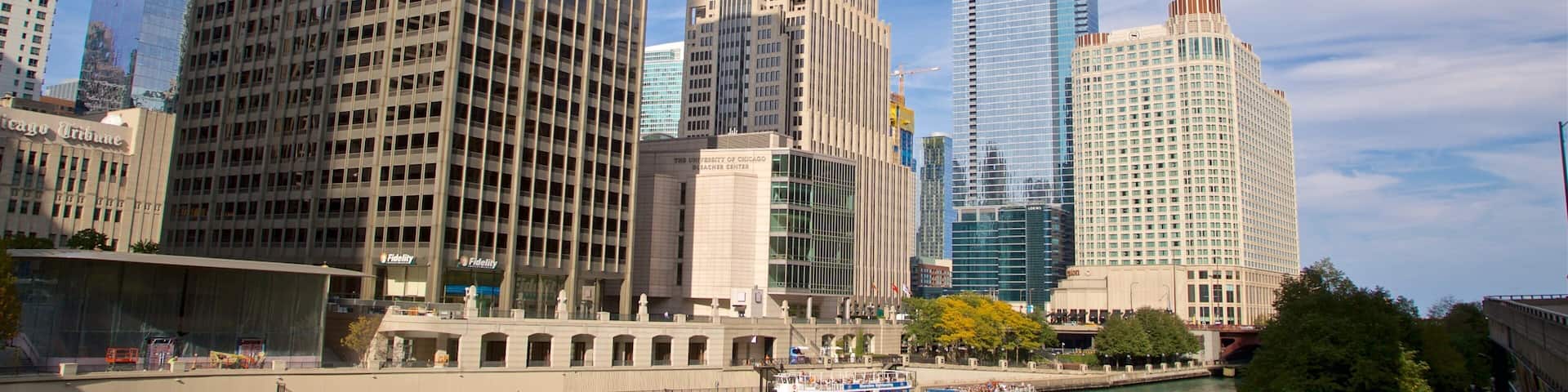 Chicago Riverwalk showing a city, a river or creek and a ferry