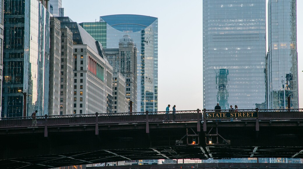 Chicago Riverwalk featuring a bridge and a city