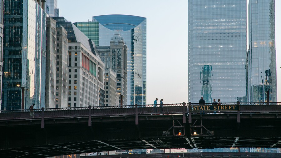 Chicago Riverwalk featuring a bridge and a city