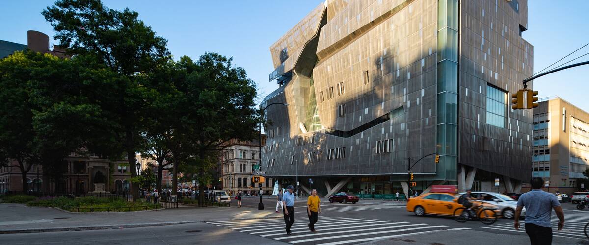 The Cooper Union for the Advancement of Science and Art which includes modern architecture and street scenes