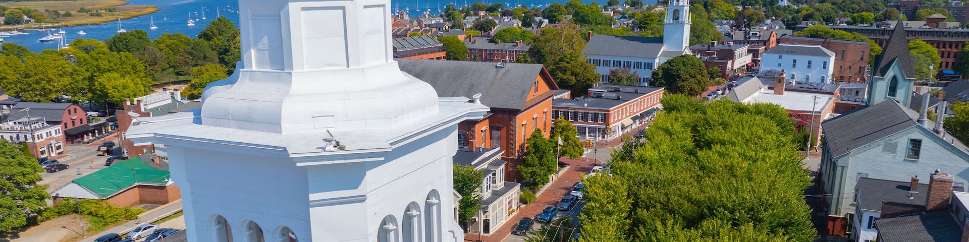 Newburyport historic downtown aerial view including Central Congregational Church with Merrimack River at the background, city of Newburyport, Massachusetts, MA, USA.