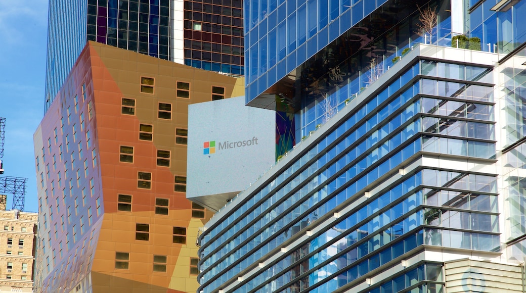 New York Times Building featuring signage and a city