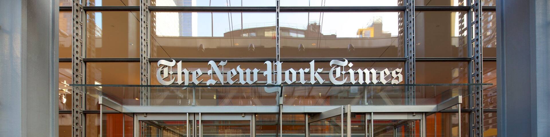 New York Times Building showing signage and a city