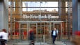 New York Times Building que incluye una ciudad y señalización