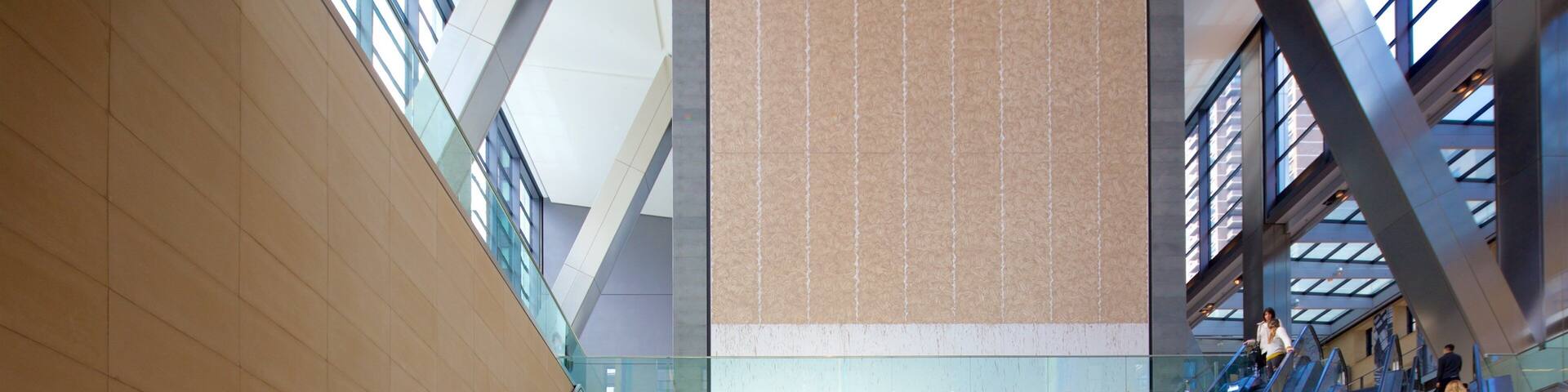 Hearst Tower which includes interior views as well as a small group of people