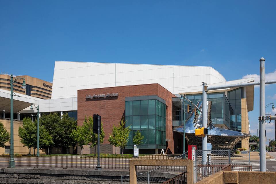 The Cannon Center with a modern glass facade and a brick section.