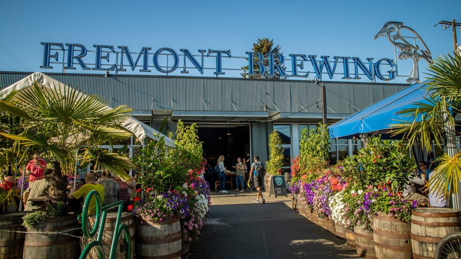 Fremont Brewing which includes flowers and signage as well as a small group of people