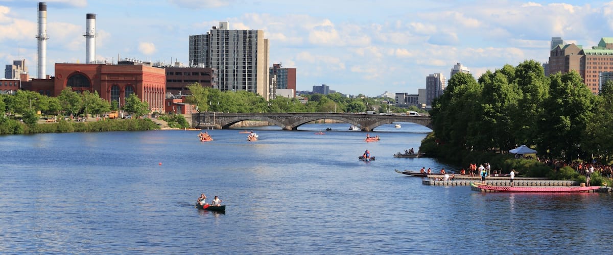 Cambridge Massachusetts summer skyline with Charles River. Western Avenue Bridge.