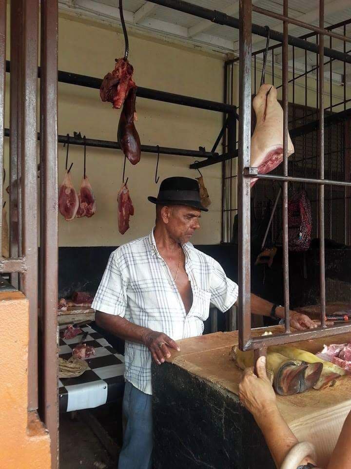 The Castries market used to be a jail, and some of it's history shows in certain alleys. Down one way, there were these cells or stalls for the selling of meats. We thought this was so cool and historic looking. #market