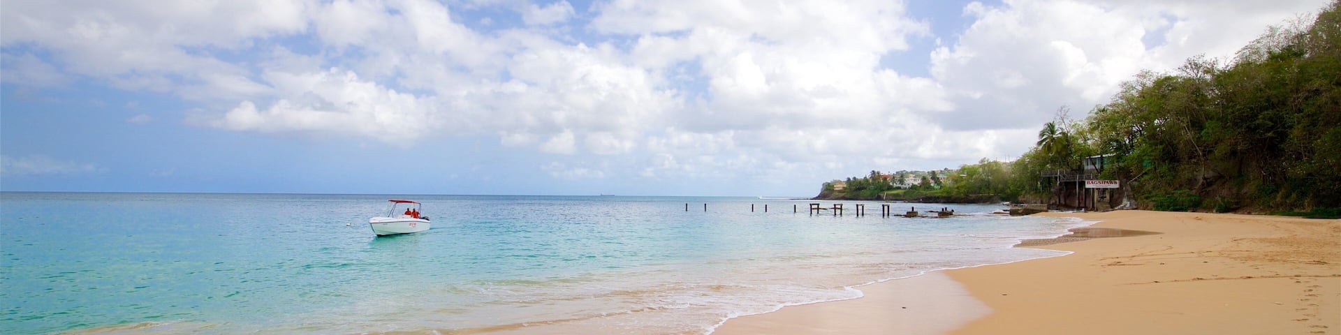 La Toc Beach which includes a sandy beach, boating and general coastal views