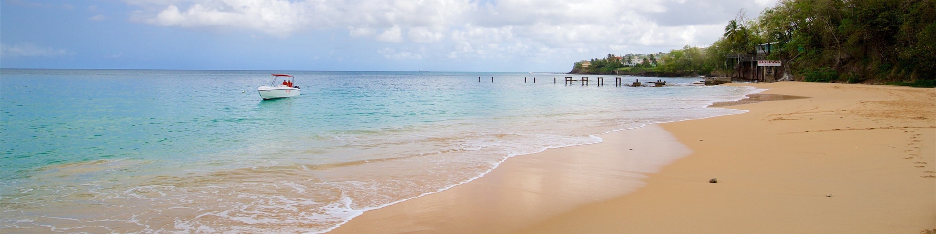 La Toc Beach which includes a sandy beach, boating and general coastal views